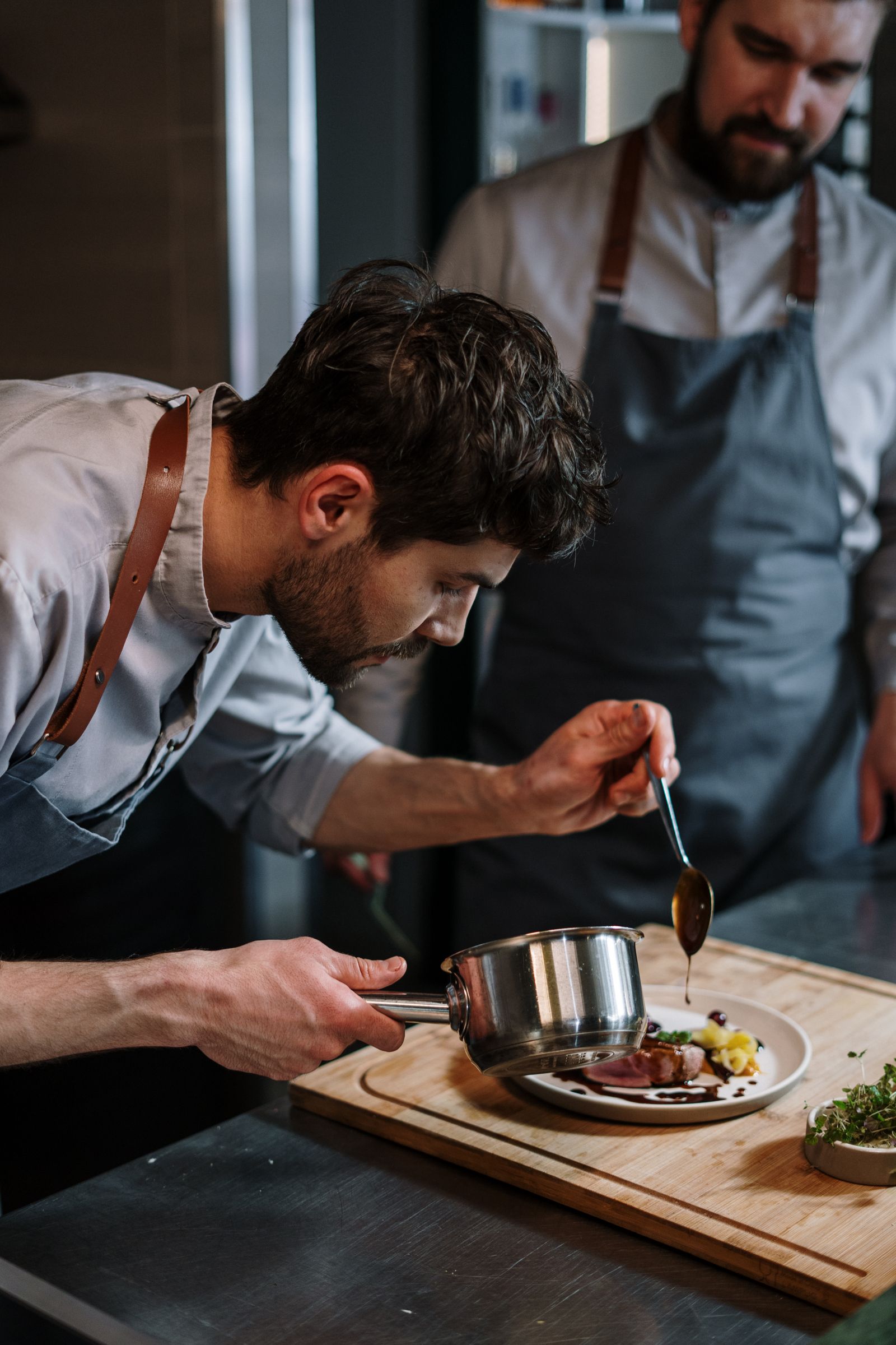 Chef preparing weekly pots in a home kitchen